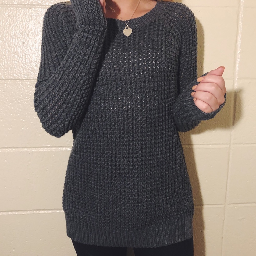 Grey crocheted long sweater.